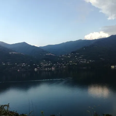 Between Mountains And Carate Urio